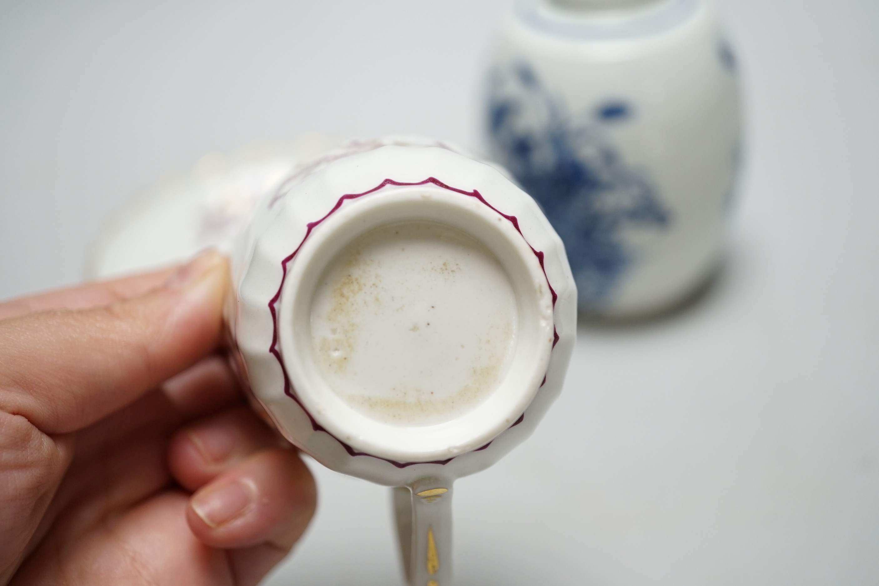 A Worcester Fence pattern tea canister, c.1775, and a Worcester wrythen coffee cup and saucer, c.1795